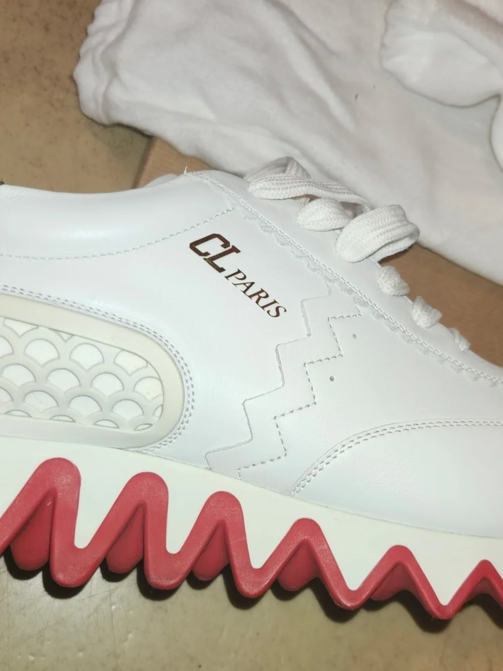 Mens  11 B Christian Louboutin  White Leather Sneakers with Red Zigzag Sole.